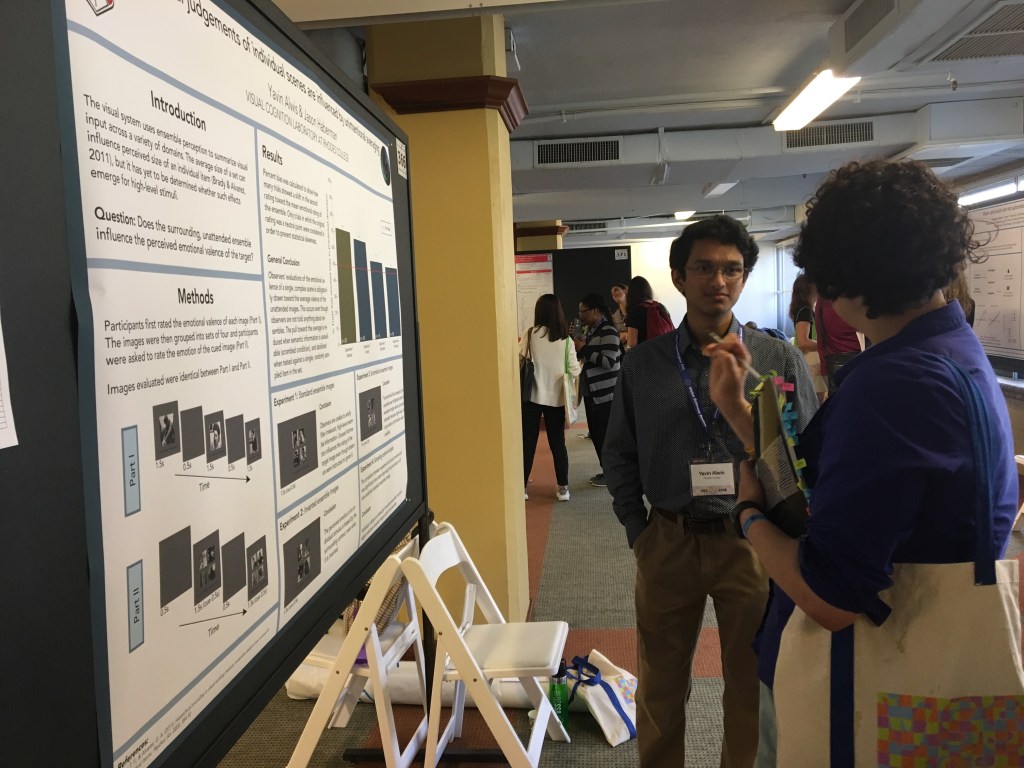 Haberman Lab student with a research poster at VSS